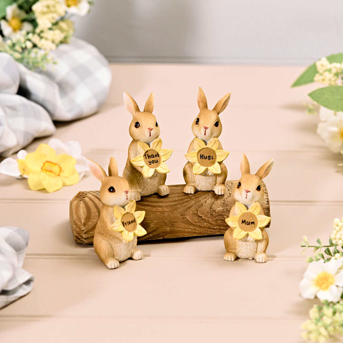 Resin Bunny Rabbit with Flower Ornament – Southwood Garden Centre